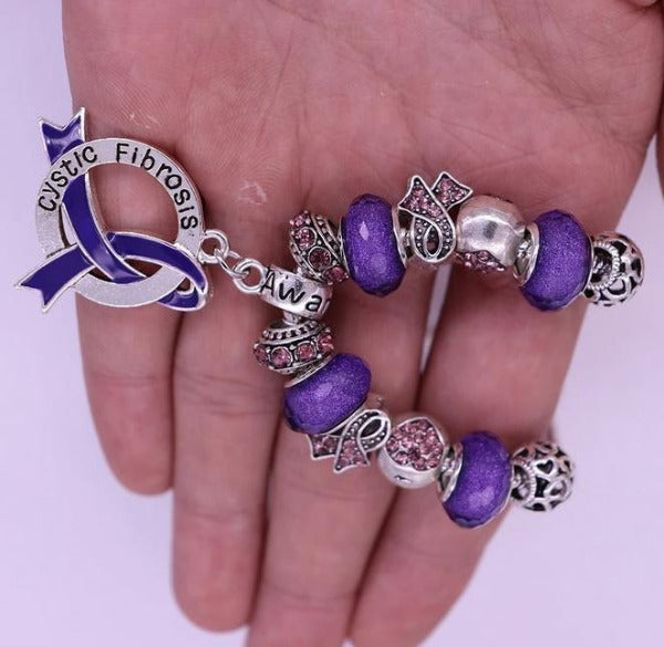 Cystic Fibrosis Awareness Luxury Charm Bracelet in hand